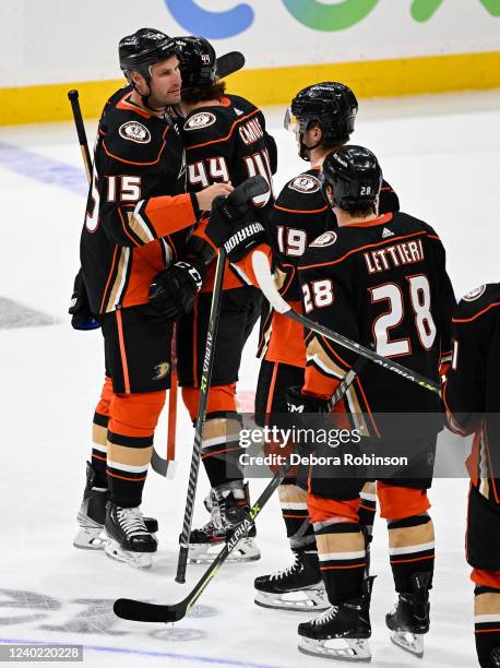 Ryan Getzlaf of the Anaheim Ducks celebrates his last career NHL game with teammates after the game against the St. Louis Blues at Honda Center on...