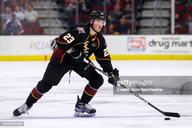 Cleveland Monsters defenceman Jake Christiansen controls the puck during the second period of the American Hockey League game between the Rochester...