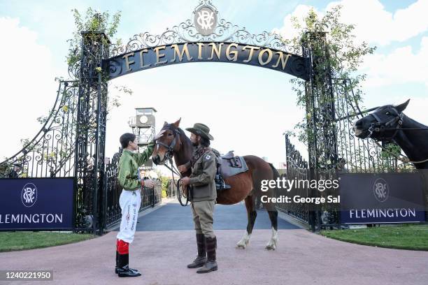 Jockey Craig Williams during the ANZAC Ceremonial service before the The Les Carlyon at Flemington Racecourse on April 25, 2022 in Flemington,...