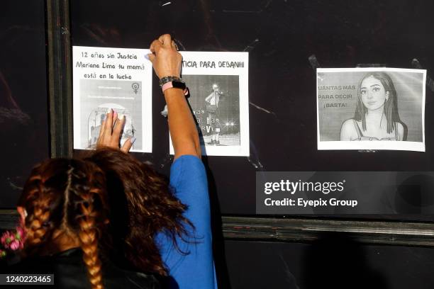 Feminist activists put the photographs of women victims of femicide outside the Attorney General's Office, demanding justice for all of them and for...