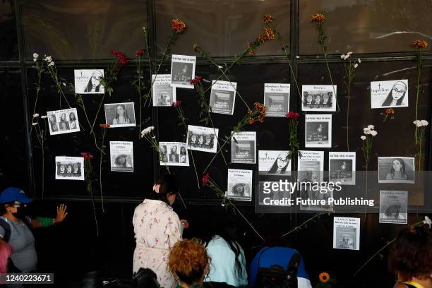 Feminist activists put the photographs of women victims of femicide outside the Attorney General's Office, demanding justice for all of them and for...
