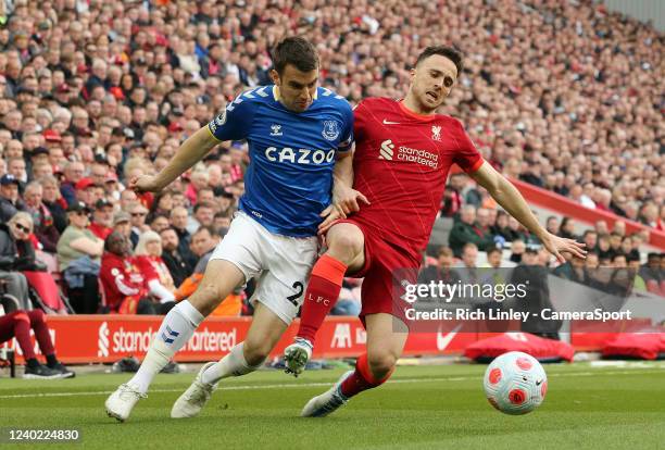 Everton's Seamus Coleman battles for possession with Liverpool's Diogo Jota during the Premier League match between Liverpool and Everton at Anfield...