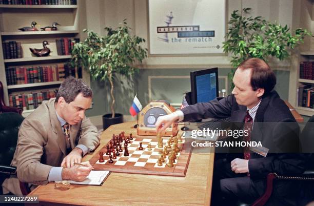 Scientist Murray Campbell makes a move for the IBM Deep Blue computer in game May 4, 1997 in New York against World Chess Champion Garry Kasparov ....