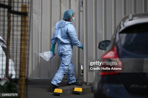 Forensic officer at the scene where three women and a man were found stabbed to death on April 25, 2022 in the Bermondsey area of London, England....