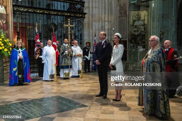 Britain's Prince William, Duke of Cambridge and Britain's Catherine, Duchess of Cambridge attend a service of commemoration and thanksgiving to mark...