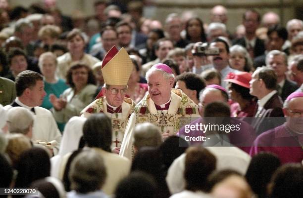 Apostolic Nuncio Gabriel Montalvo and Bishop Edward michael Egan make their way down the aisle into St. Patrick's Cathedral for the Ceremony of...