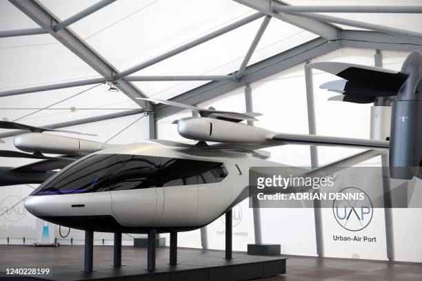 Scale model of an electric air vehicle made by Supernal, a company developing a family of electric air vehicles, is displayed at Air-One, the world's...
