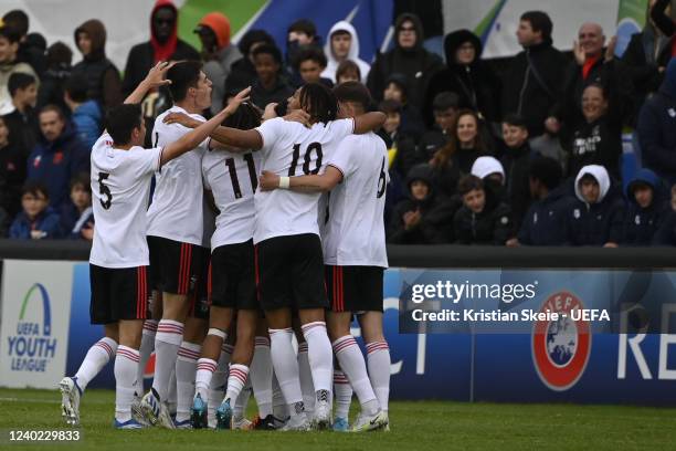 Benfica players celebrate their second goal during the UEFA Youth League Final between FC Salzburg and SL Benfica at Colovray Sports Centre on April...