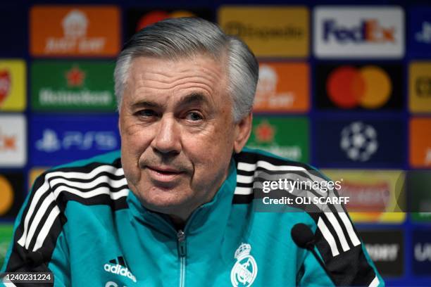 Real Madrid's Italian coach Carlo Ancelotti reacts as he speaks during a press conference at the Etihad Stadium in Manchester, north west England, on...