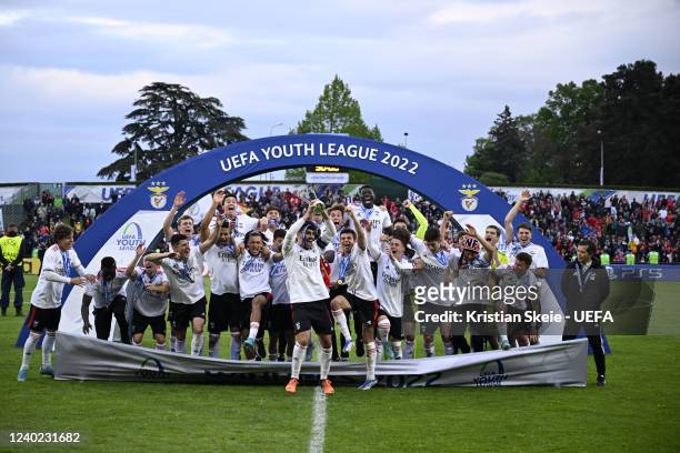 Benifca captain Tomas Araujo lifts the UEFA Youth League trophy after having won the UEFA Youth League Final between FC Salzburg and SL Benfica at...