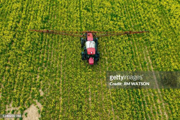 Farmer spreads pesticide on a field in Centreville, Maryland, on April 25, 2022.