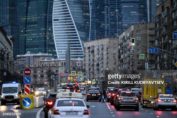 Traffic jam is pictured in front of skyscrapers at the Moscow International Business Center in Moscow on April 25, 2022.