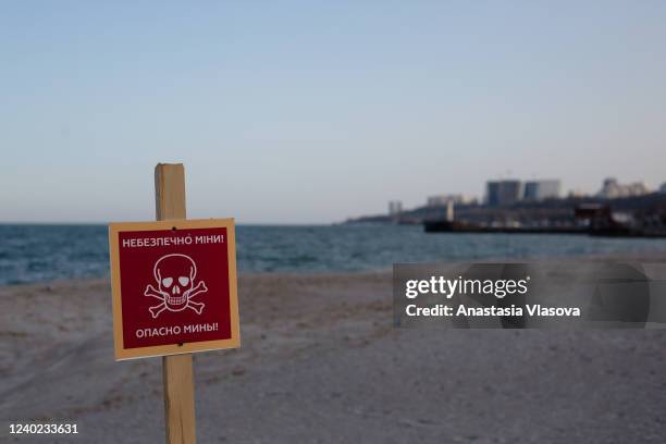 View of the sign which reads "Caution: mines" on the beach on April 25, 2022 in Odessa, Ukraine. Ukrainian forces, as well as civilian Odessans,...