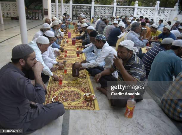 Indian Muslim devotees break their fast during the holy fasting month of Ramadan at mosque, in New Delhi India on April 24, 2022.