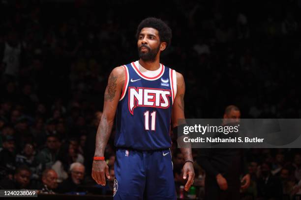 Kyrie Irving of the Brooklyn Nets smiles during Round 1 Game 4 of the 2022 NBA Playoffs on April 25, 2022 at Barclays Center in Brooklyn, New York....