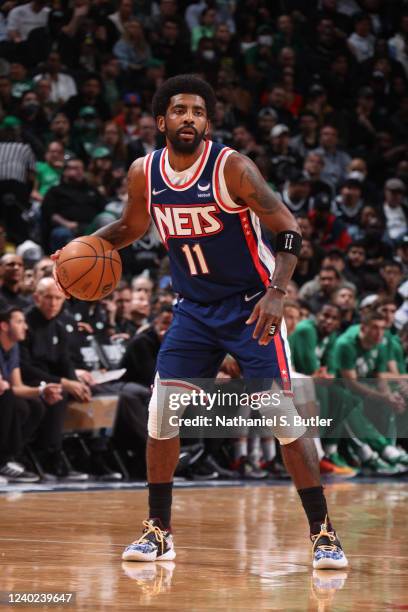 Kyrie Irving of the Brooklyn Nets dribbles the ball against the Boston Celtics during Round 1 Game 4 of the 2022 NBA Playoffs on April 25, 2022 at...