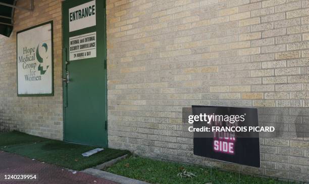 Sign reading "I'm on Your Side" is planted on the lawn in front of the monitored entrance to Hope Medical Group for Women in Shreveport, Louisiana on...