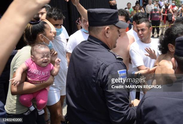People arrested for alleged gang links are escorted by the National Civil Police during the state of emergency declared by the Salvadoran government...