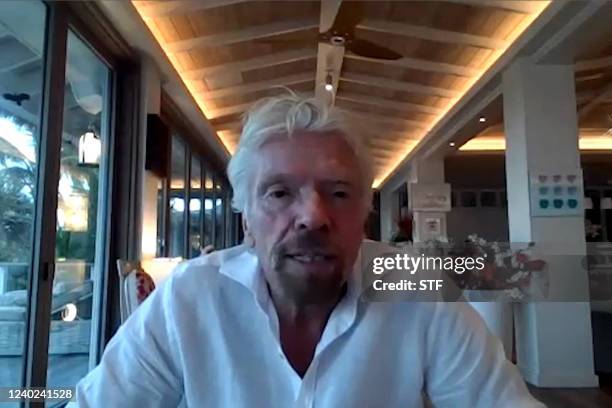 This screen grab taken from AFPTV video on April 25, 2022 shows British tycoon Richard Branson speaking via a video call with AFP's office in...