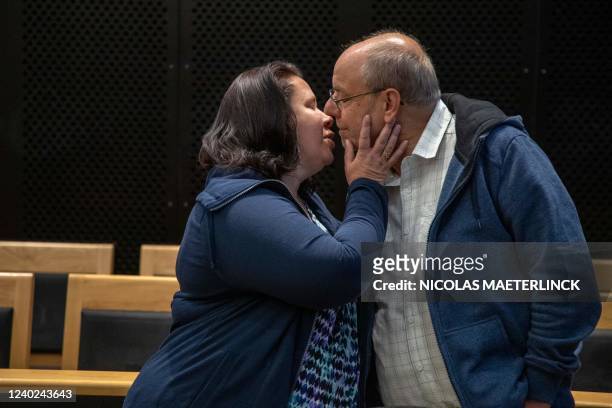 The accused Sylvia Boigelot and Christian Van Eyken kiss during the arrest session in the case of former politician Van Eyken and his partner...