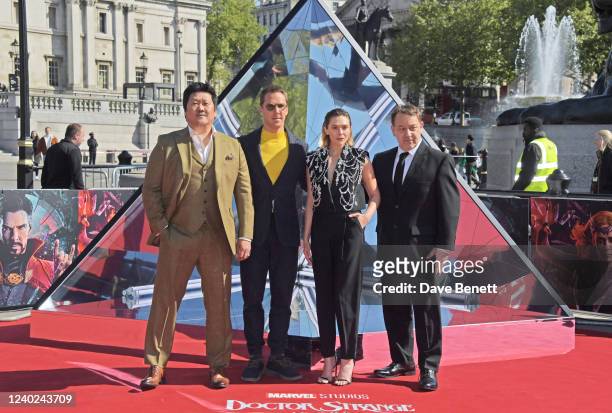 Benedict Wong, Benedict Cumberbatch, Elizabeth Olsen and Sam Raimi attend "Doctor Strange In The Multiverse Of Madness" photocall in Trafalgar Square...