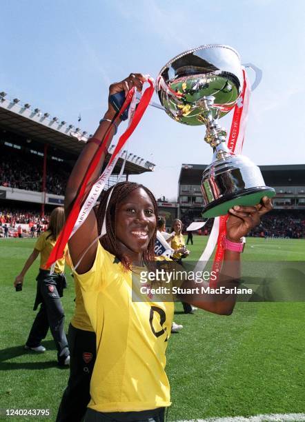 Anita Asante of Arsenal poses with the Premier League Trophy after the Women's Premier League match between Arsenal Women and Tottenham Hotspur at...