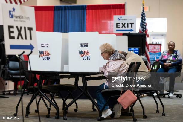 Voters use an optional paper ballot voting booth as they cast their ballots early for the May 3 Primary Election at the Franklin County Board of...