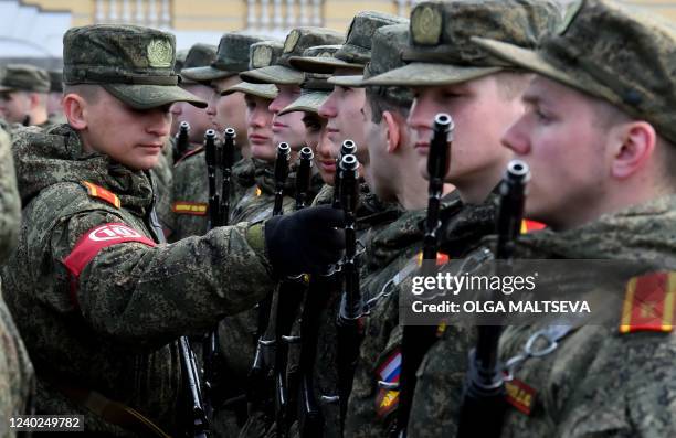 Russian military cadets take part in a rehearsal for the Victory Day military parade on Dvortsovaya Square in Saint Petersburg on April 26, 2022. -...