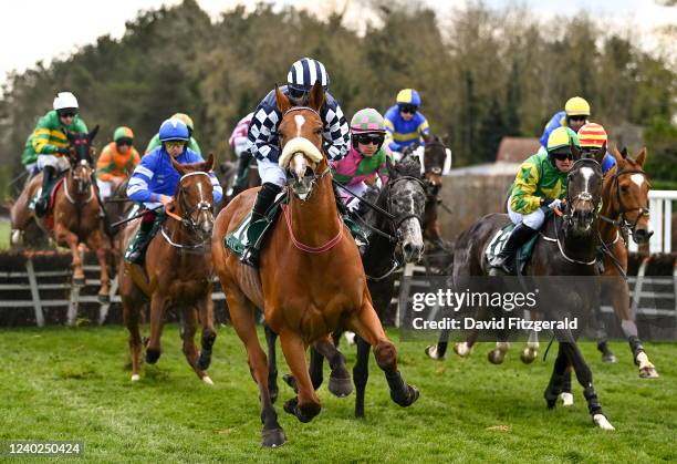 , Ireland - 26 April 2022; Ardla, with Luke Demspey up, left, in action during the Killashee Hotel Handicap Hurdle during the Punchestown Festival...