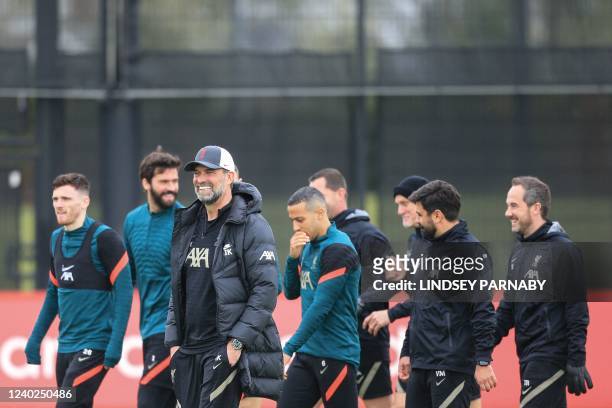 Liverpool's German manager Jurgen Klopp arrives to lead a team training session at Anfield Stadium in Liverpool, north west England, on April 26 on...