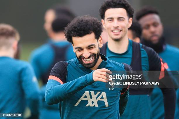 Liverpool's Egyptian midfielder Mohamed Salah attends a team training session at Anfield Stadium in Liverpool, north west England, on April 26 on the...