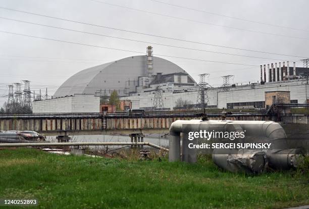 This photograph taken on April 26, 2022 shows the New Safe Confinement at Chernobyl Nuclear Power Plant which cover the number 4 reactor unit, on the...