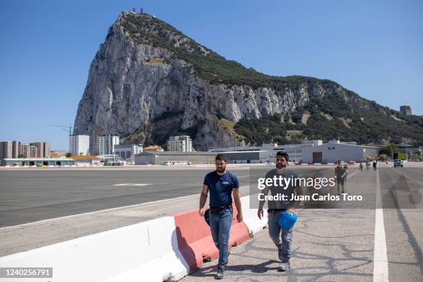 Cross-border workers walk to exit the rock on June 01, 2020 in Gibraltar. The only Spanish people allowed to enter Gibraltar were cross frontier...