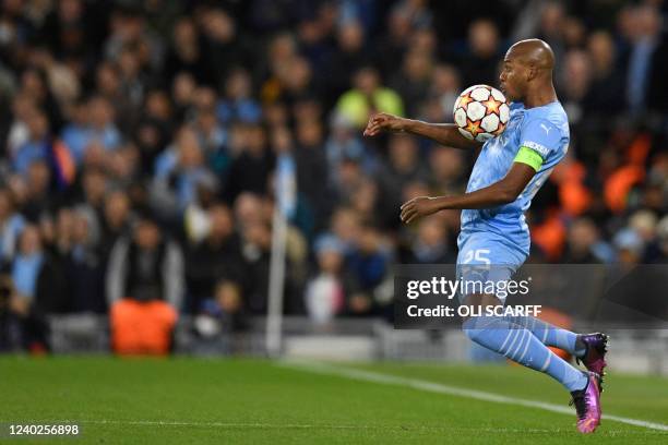 Manchester City's Brazilian midfielder Fernandinho controls the ball during the UEFA Champions League semi-final first leg football match between...