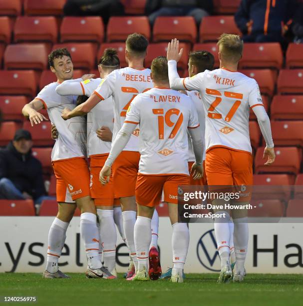 Blackpool's Owen Dale is congratulated on scoring his teams first goal during the Sky Bet Championship match between Barnsley and Blackpool at...