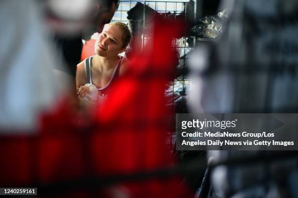 Glendale, CA UFC Bantamweight Champion Ronda Rousey has her hands wrapped by coach Edmond Tarverdyan at the Glendale Fighting Club in Glendale, CA....
