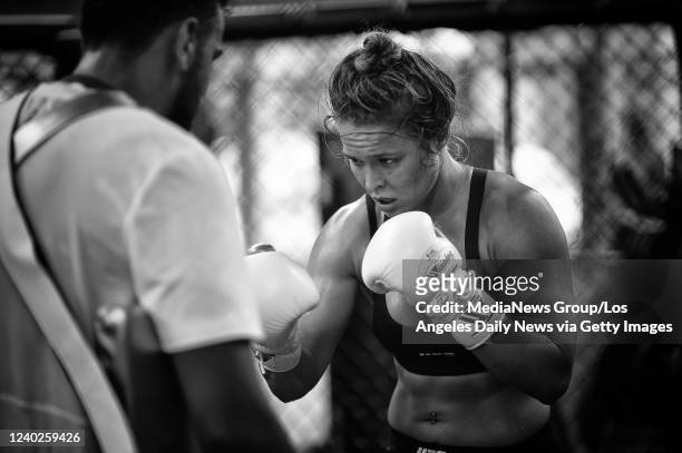 Glendale, CA UFC Bantamweight Champion Ronda Rousey works with coach Edmond Tarverdyan at the Glendale Fighting Club in Glendale, CA. Saturday, July...