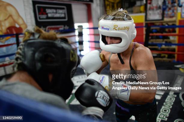 Glendale, CA UFC Bantamweight Champion Ronda Rousey spars with IFBA Champion Lissette Medel at the Glendale Fighting Club in Glendale, CA. Tuesday,...