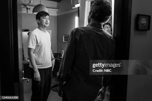 Episode 1282 -- Pictured: Comedian Phil Wang talks with host Seth Meyers backstage on April 26, 2022 --