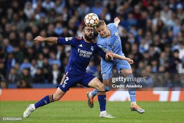 April:Daniel Carvajal of Real Madrid and Oleksandr Zinchenko of Manchester City compete for the ball during the UEFA Champions League Semi Final Leg...