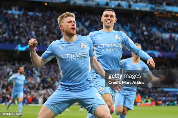 Kevin De Bruyne of Manchester City celebrates scoring their 1st goal with Phil Foden of Manchester City during the UEFA Champions League Semi Final...