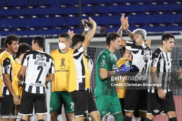 Martín Silva goalkeeper of Libertad celebrates with teammates after winning a match between Libertad and Athletico Paranaense as part of Copa...