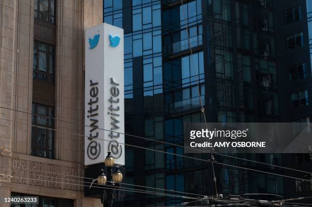 The Twitter logo is seen at their headquarters on April 26, 2022 in downtown San Francisco, California. - Billionaire Elon Musk is capturing a social...