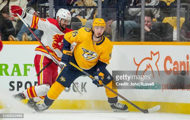 Matt Duchene of the Nashville Predators skates against Oliver Kylington of the Calgary Flames during an NHL game at Bridgestone Arena on April 26,...