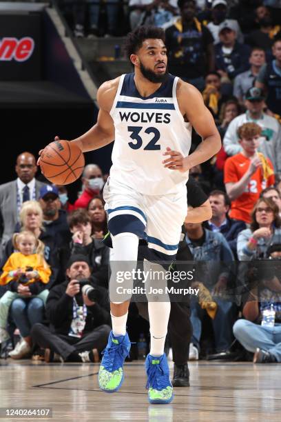 Karl-Anthony Towns of the Minnesota Timberwolves dribbles the ball against the Memphis Grizzlies during Round 1 Game 5 of the 2022 NBA Playoffs on...