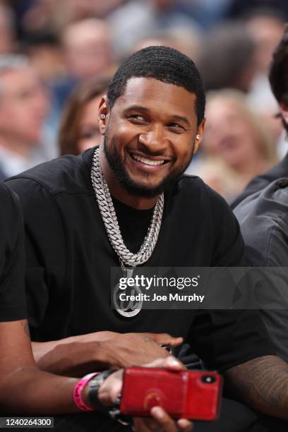 Singer, Usher attends the game between the Minnesota Timberwolves and the Memphis Grizzlies during Round 1 Game 5 of the 2022 NBA Playoffs on April...