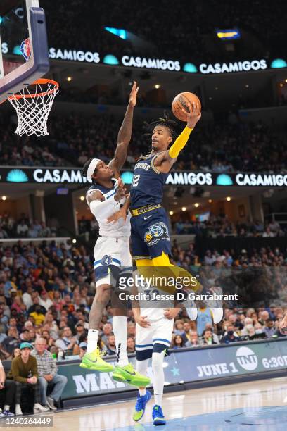 Ja Morant of the Memphis Grizzlies shoots the game-winning layup against the Minnesota Timberwolves during Round 1 Game 5 on April 26, 2022 at...