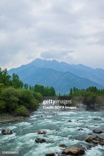 General view of Lidder river against a backdrop of mountains in Pahalgam a famous tourist destination in the Himalayan region's Indian Administered...