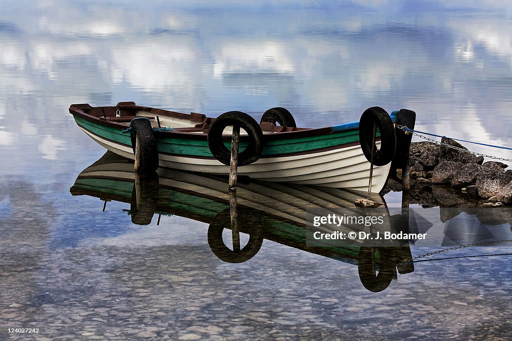 Rowing boat reflection
