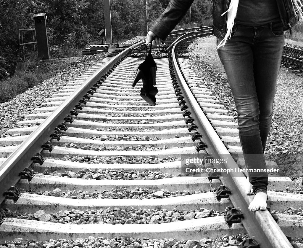 Woman Rails Woman Walking On Train Rails High-Res Stock Photo - Getty Images